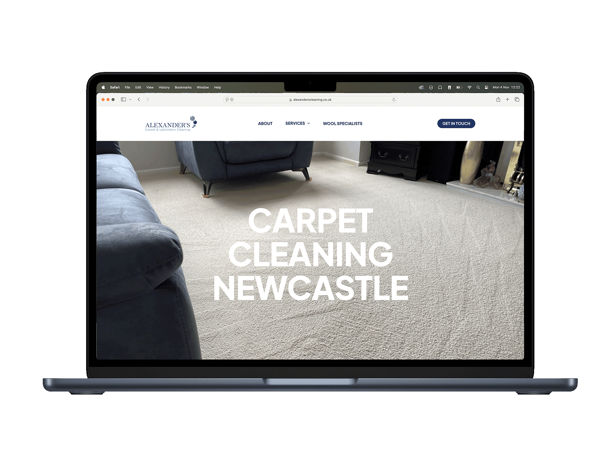Carpet cleaning service in Newcastle on laptop screen.
